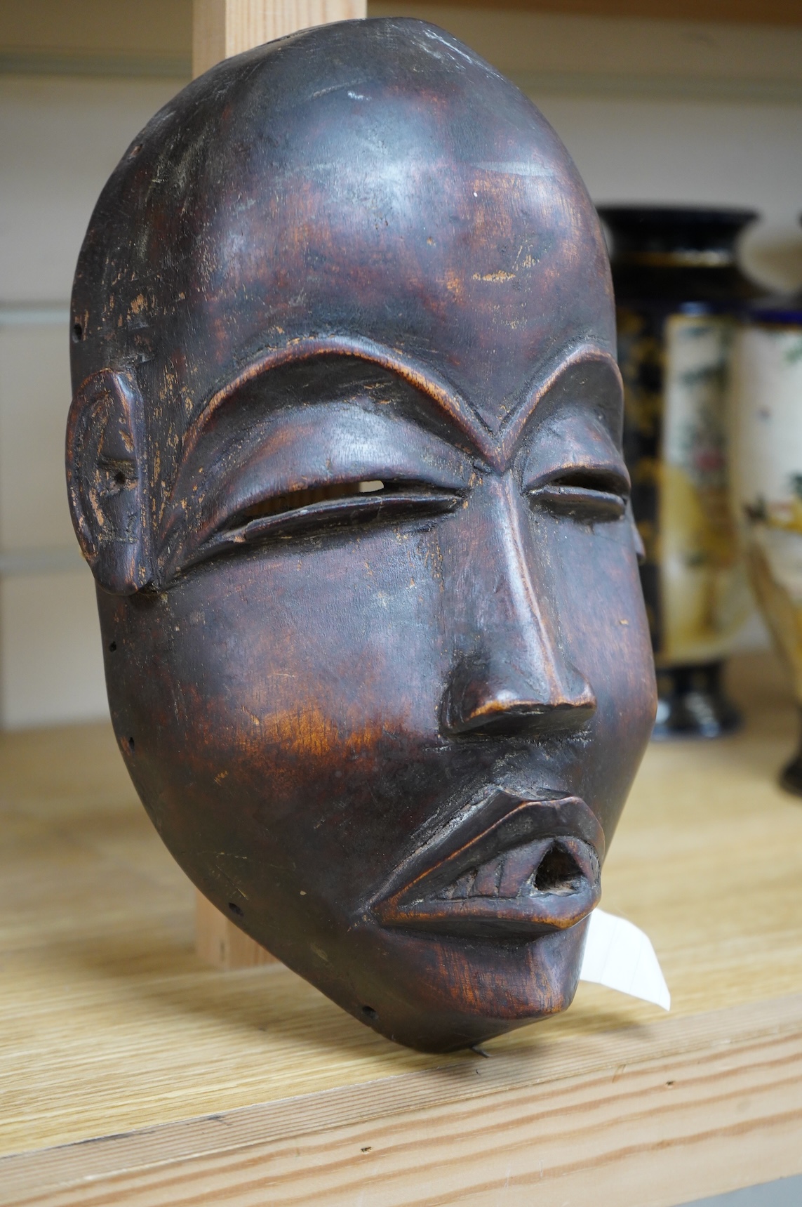 An African Guro tribe hardwood mask, 27cm high
